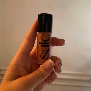 Saie dew liquid cheek blush in “rosy”